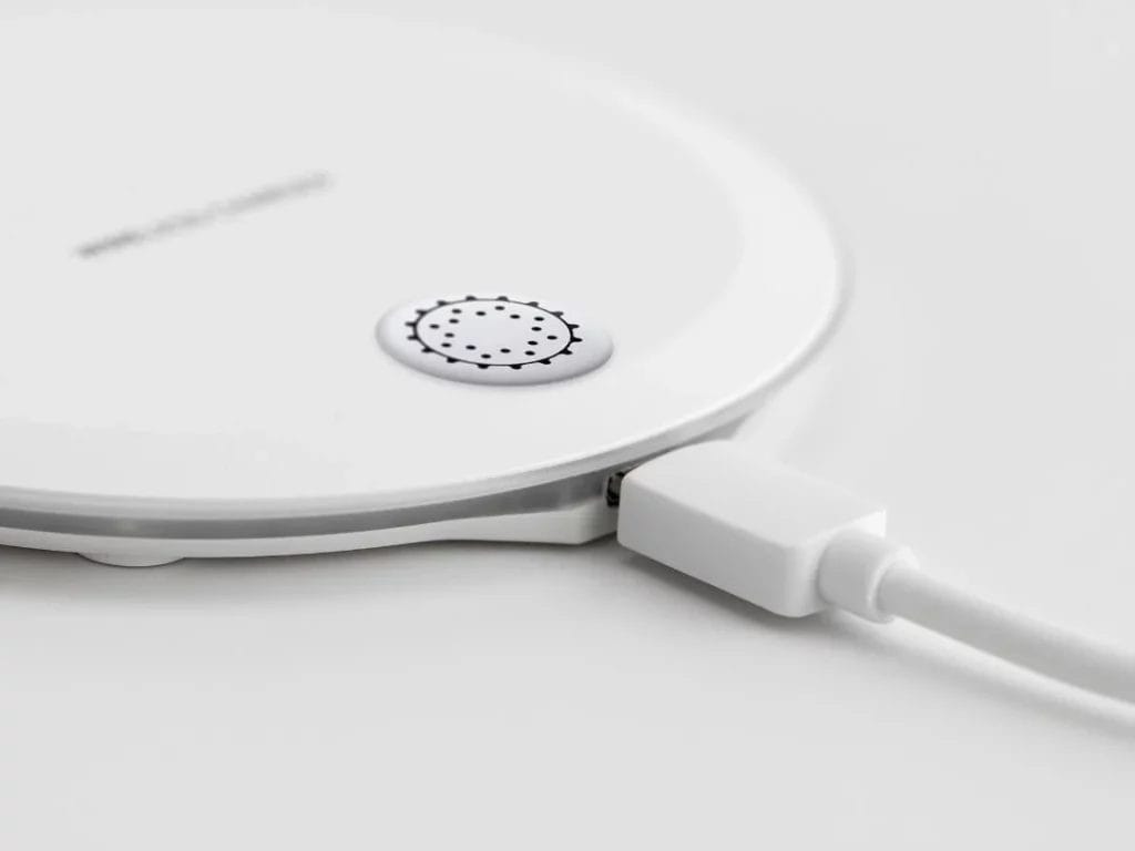 Wireless charging pad with Penta Power Tag — induction radiation from wireless chargers transformed into life-supporting energy